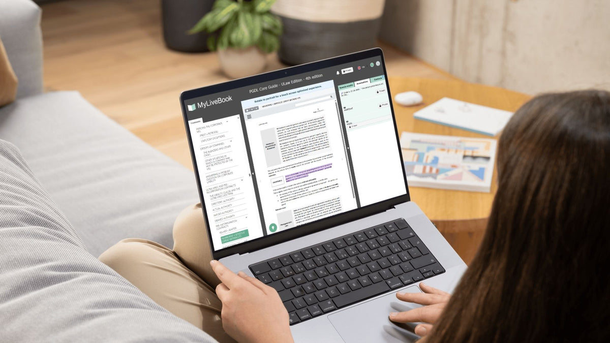 A student reading a Law Answered guide in MyLiveBook